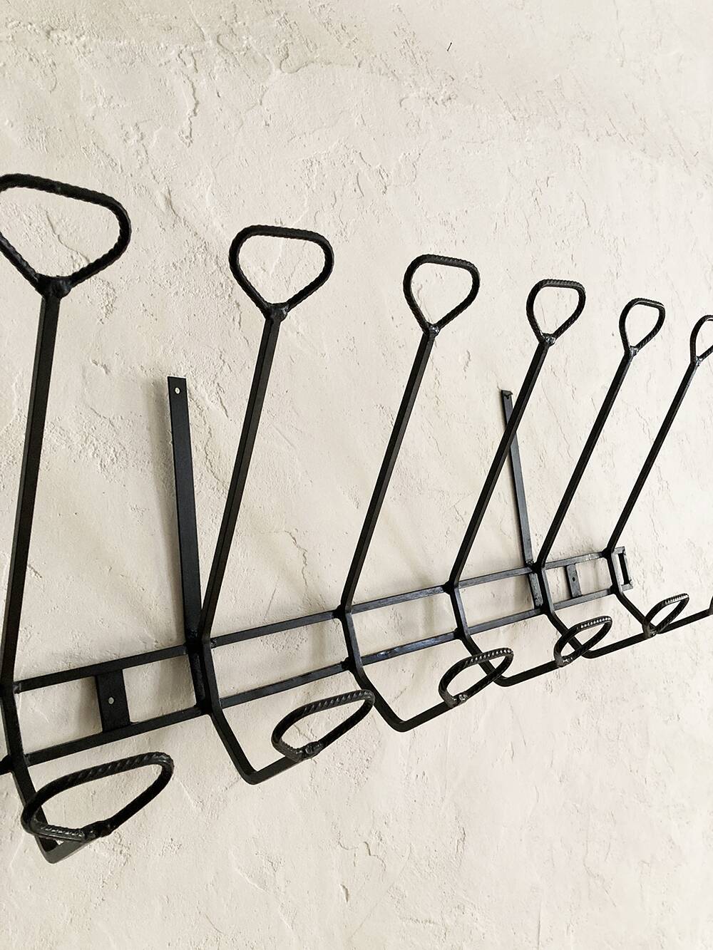 Wall-mounted coat rack with 12 hooks in handcrafted wrought iron