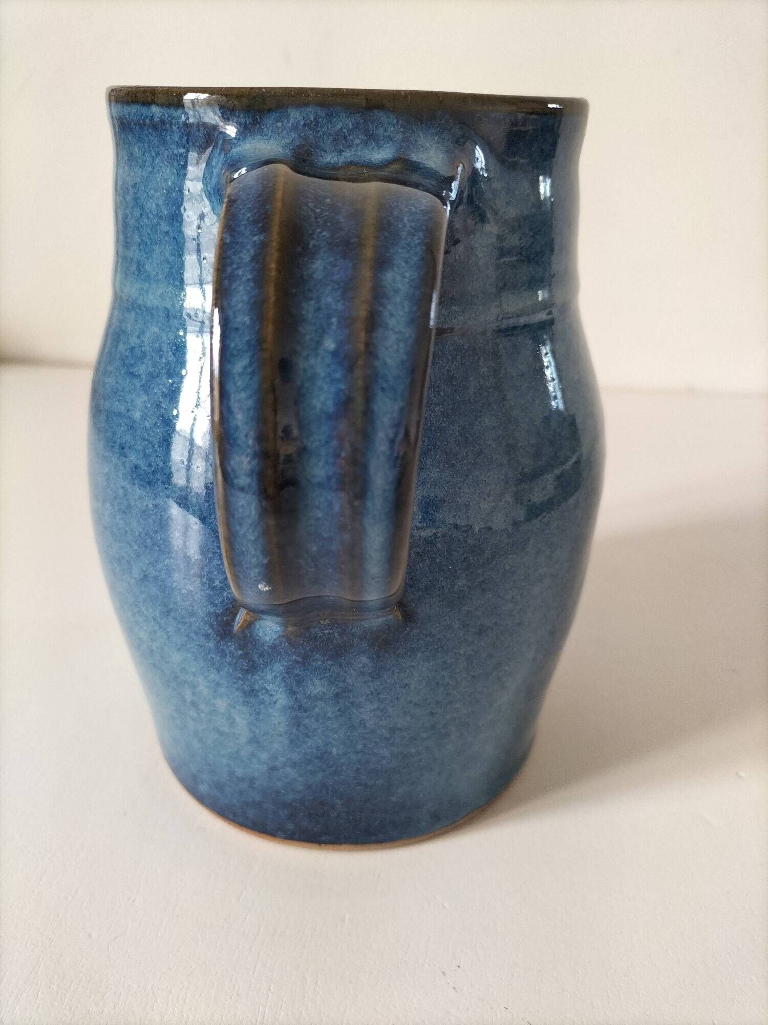 Blue glazed stoneware jug