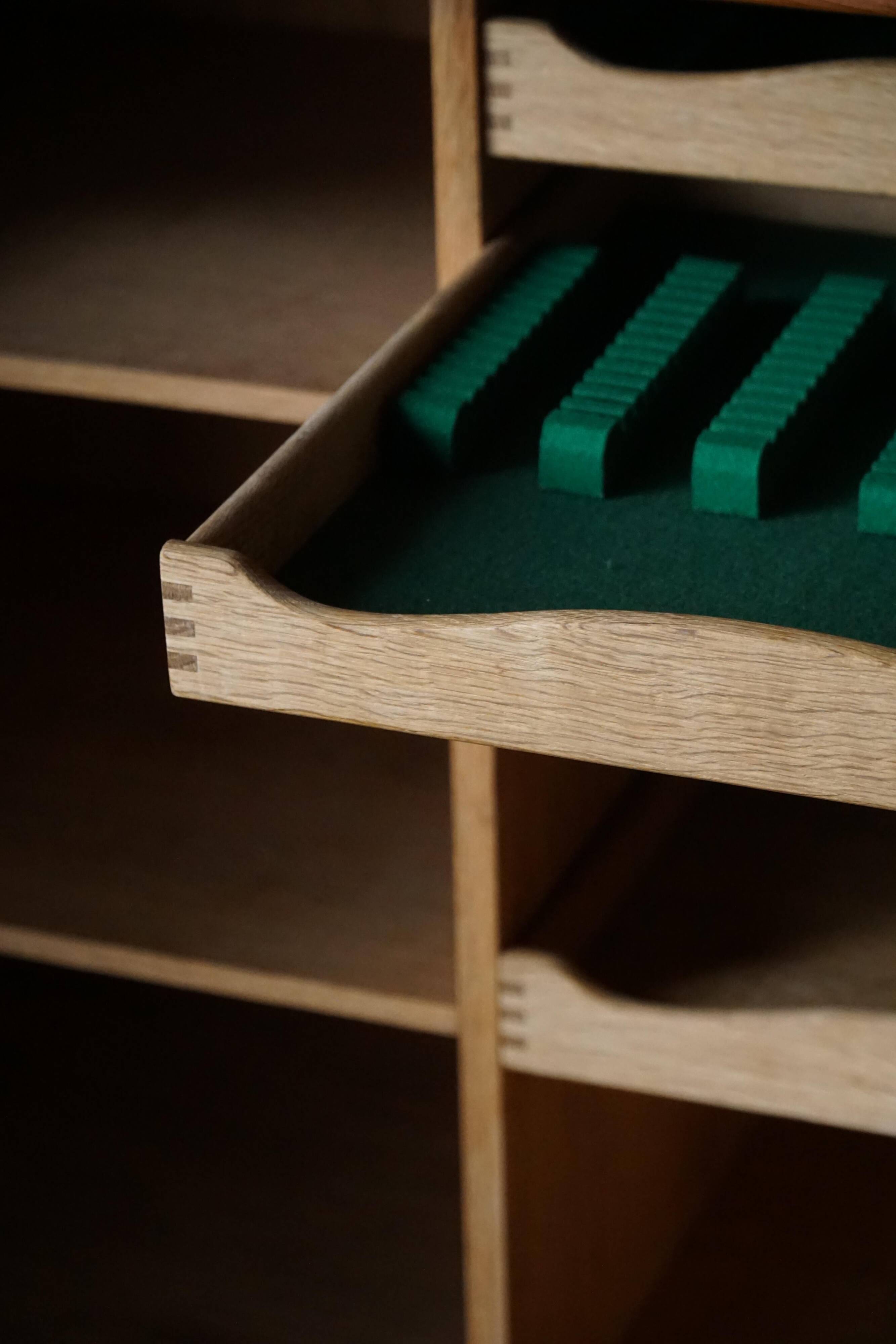 Henning Kjærnulf, enfilade in oak, mid-century Danish, Nyrup Møbelfabrik, 1960s.