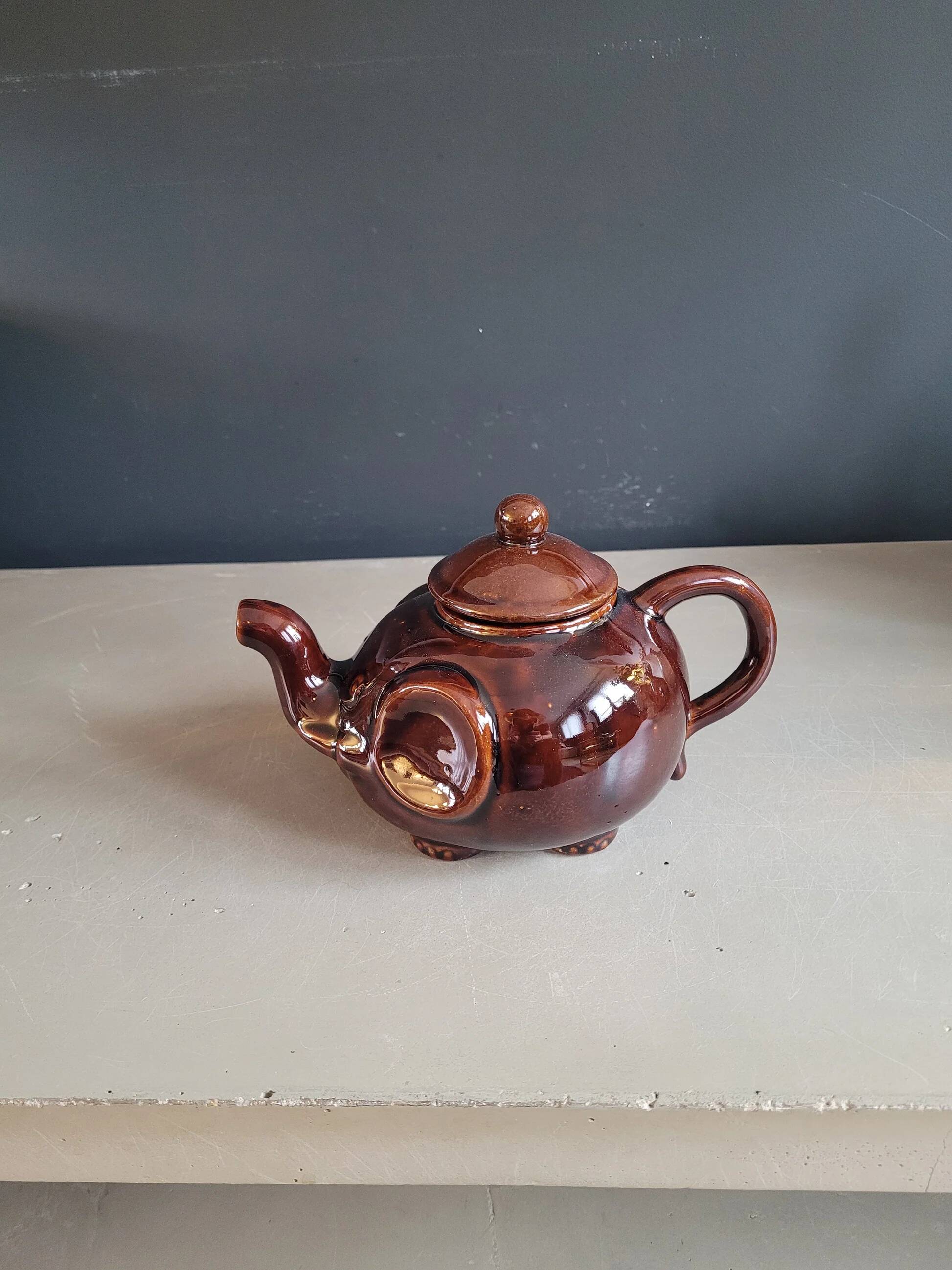 Brown porcelain elephant teapot