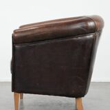 Characterful club armchair made of sheepskin with a beautiful patina