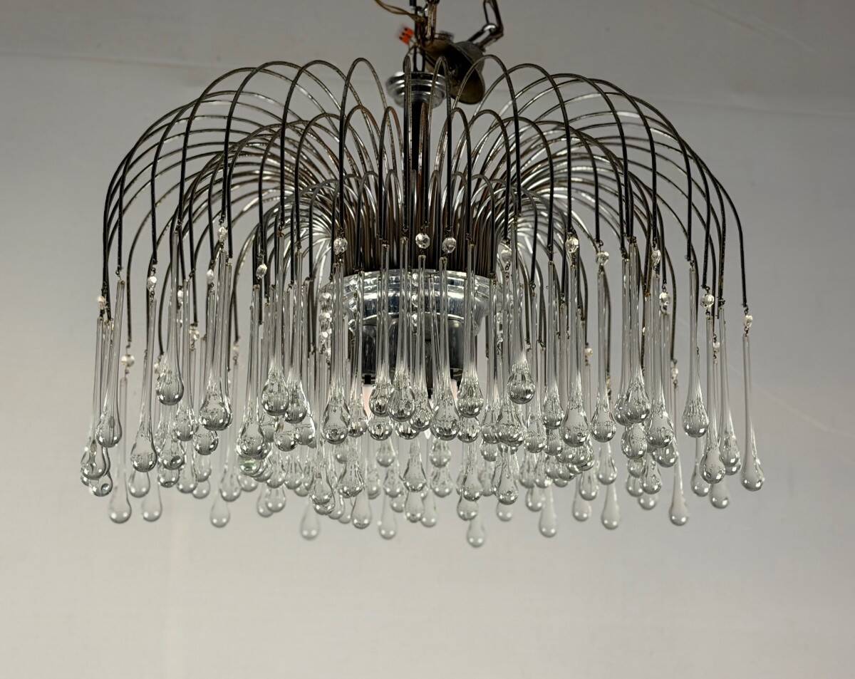 Pair of large chandeliers adorned with glass drops, chrome metal structures, Italy circa 1960.