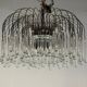Pair of large chandeliers adorned with glass drops, chrome metal structures, Italy circa 1960.