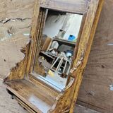 Antique barber's mirror in Burmese teak.