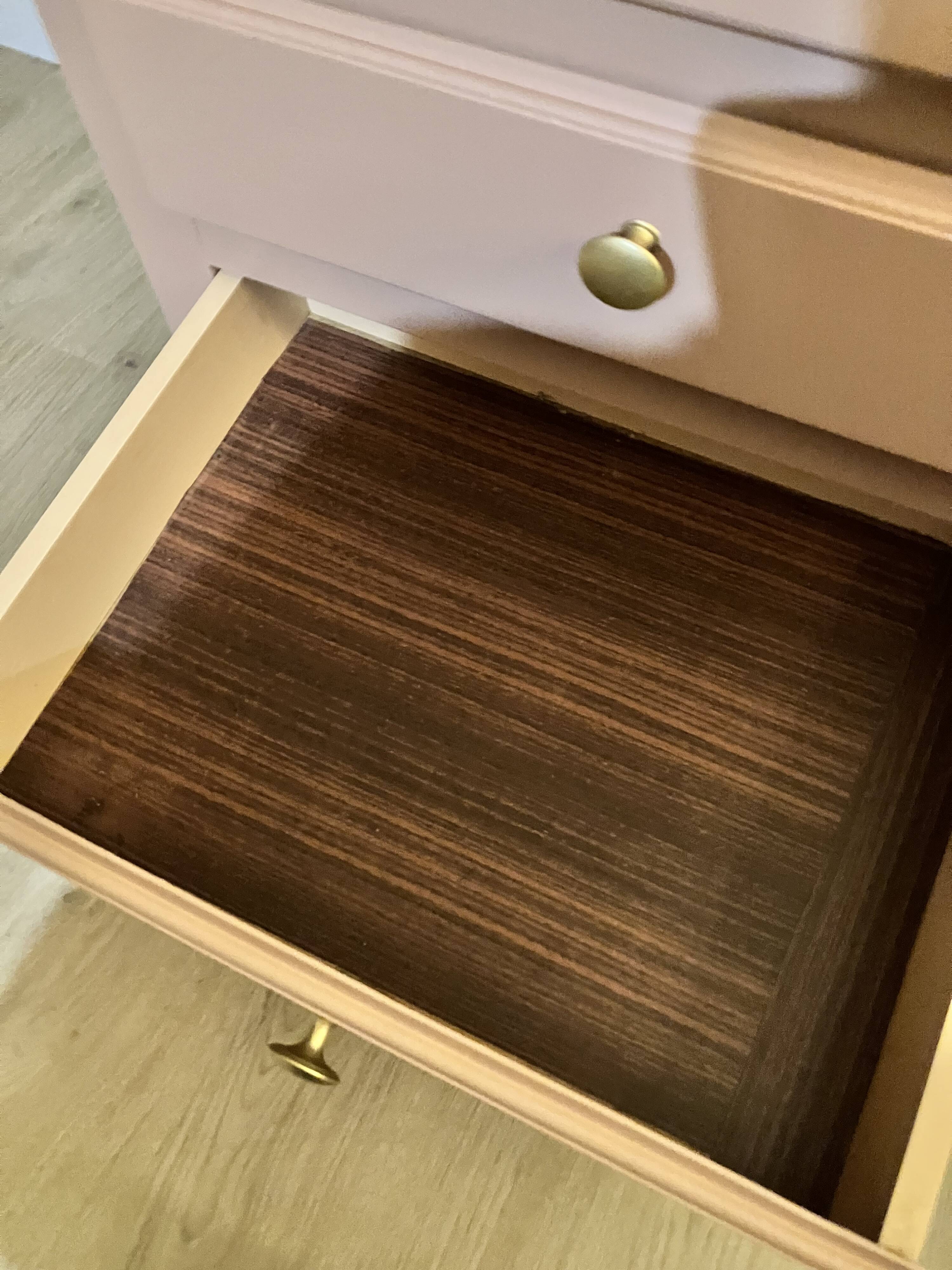 Pink wooden chest of drawers