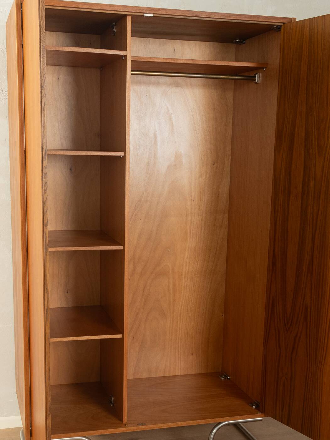 Purist wardrobe from the 1960s in teak veneer by DeWe