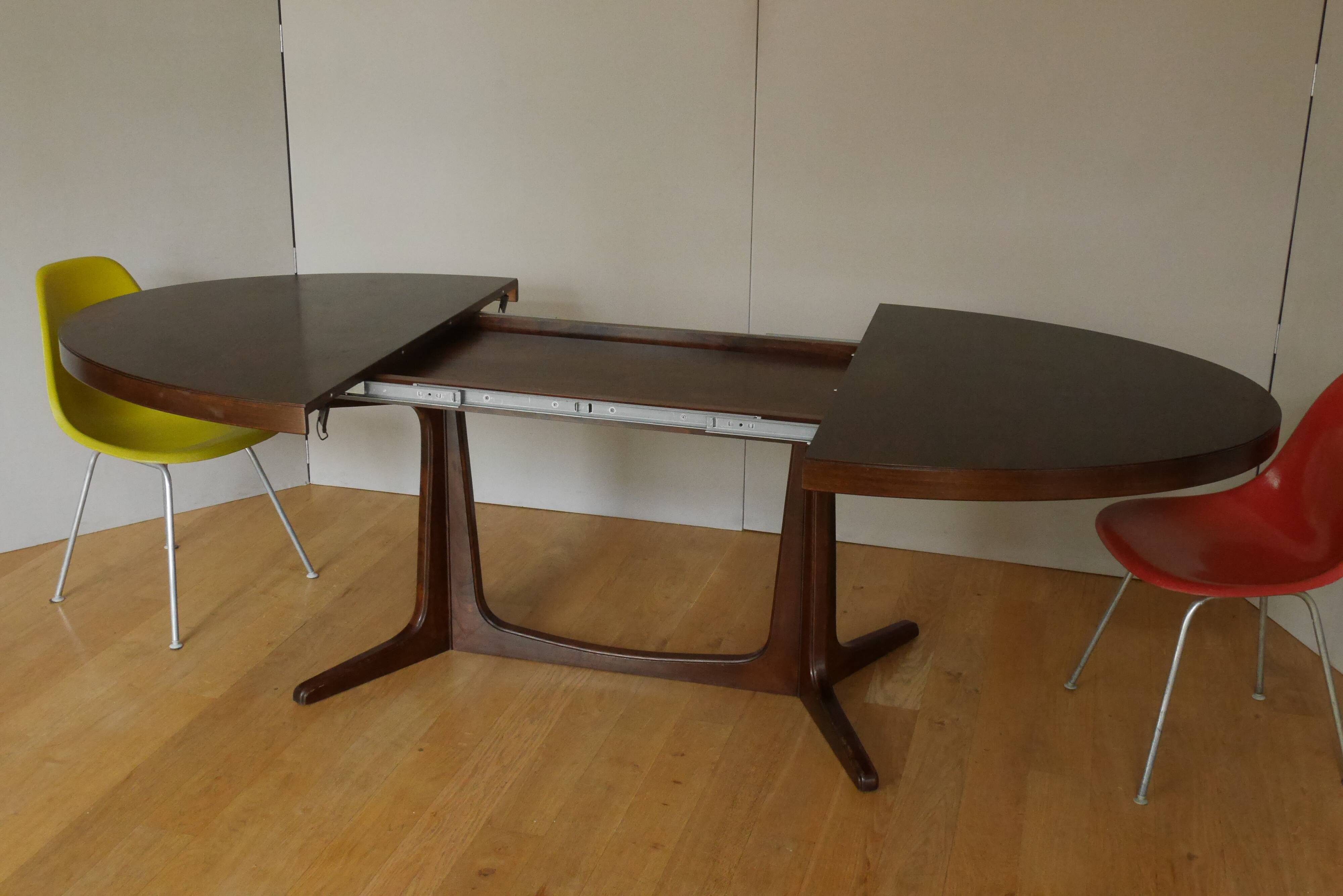 Extendable oval elm table with Baumann extensions