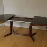 Extendable oval elm table with Baumann extensions