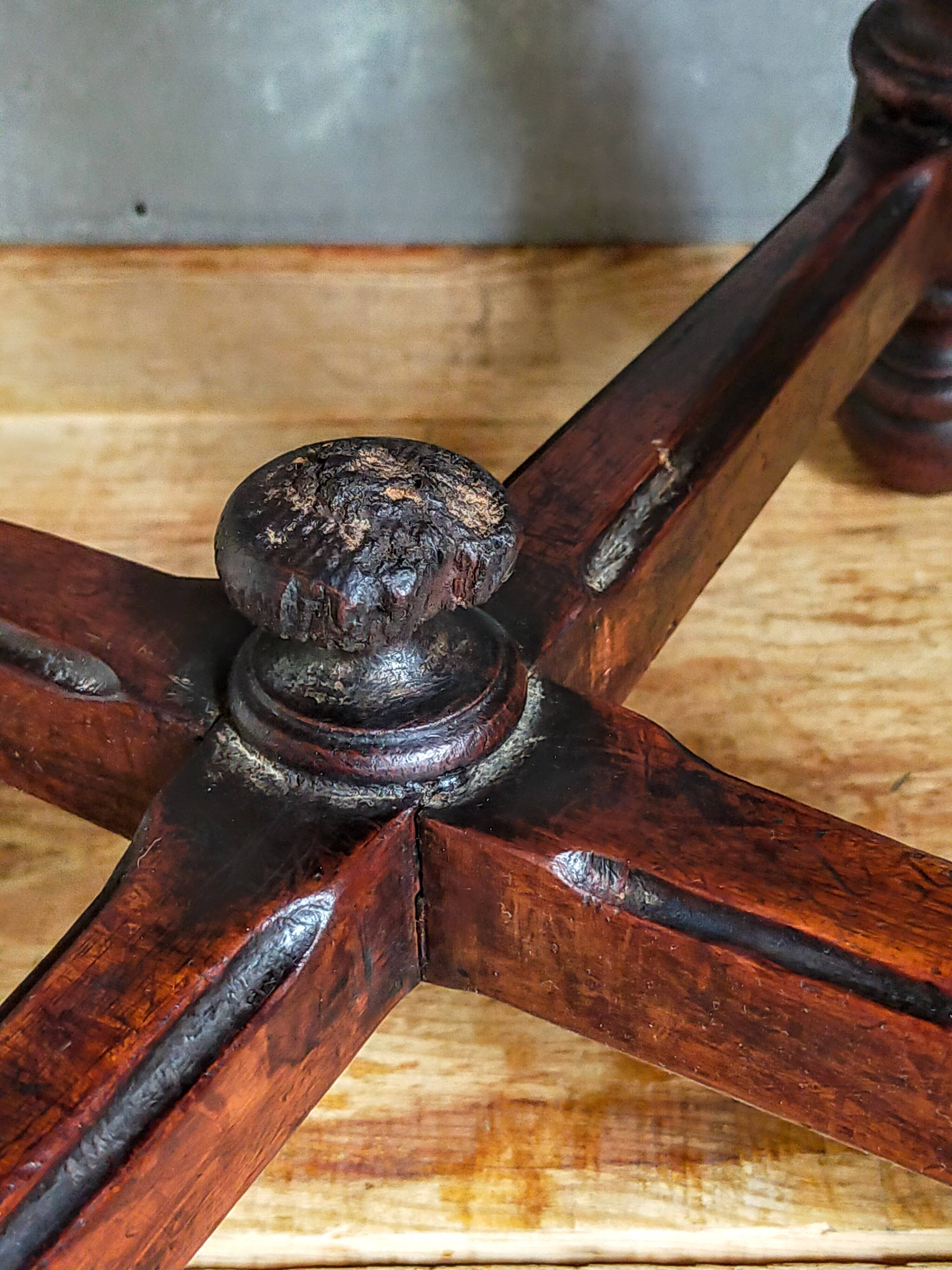 Antique stool in turned and carved solid wood