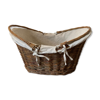 Old wicker and linen basket with two handles