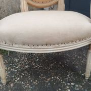 Antique armchair in Louis XVI style from the late 19th century.