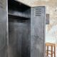 Industrial locker room in raw metal, circa 1930.