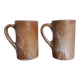 Enamelled stoneware mugs