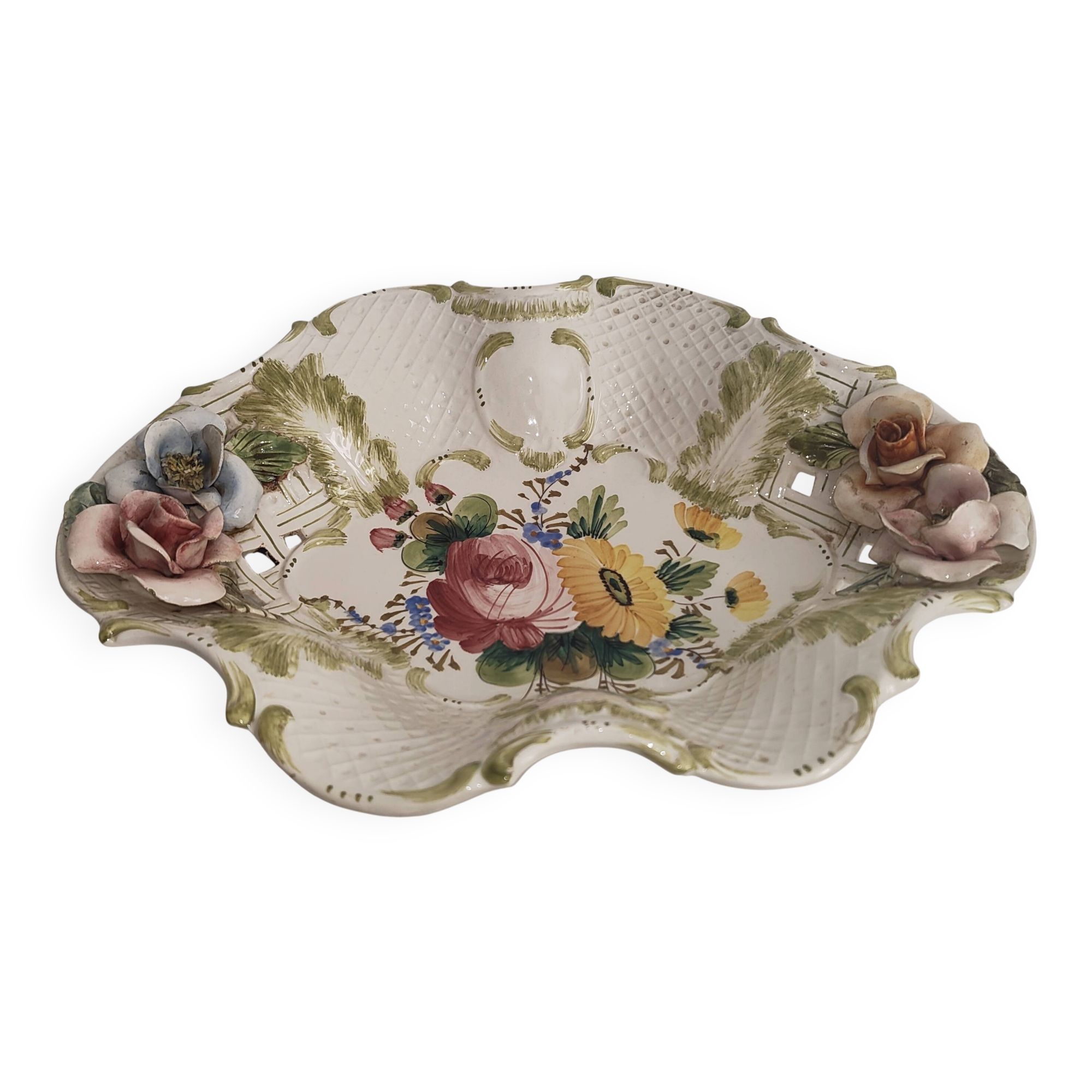 Openwork ceramic bowl with raised flower decoration in Italian style.