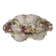 Openwork ceramic bowl with raised flower decoration in Italian style.