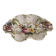 Openwork ceramic bowl with raised flower decoration in Italian style.