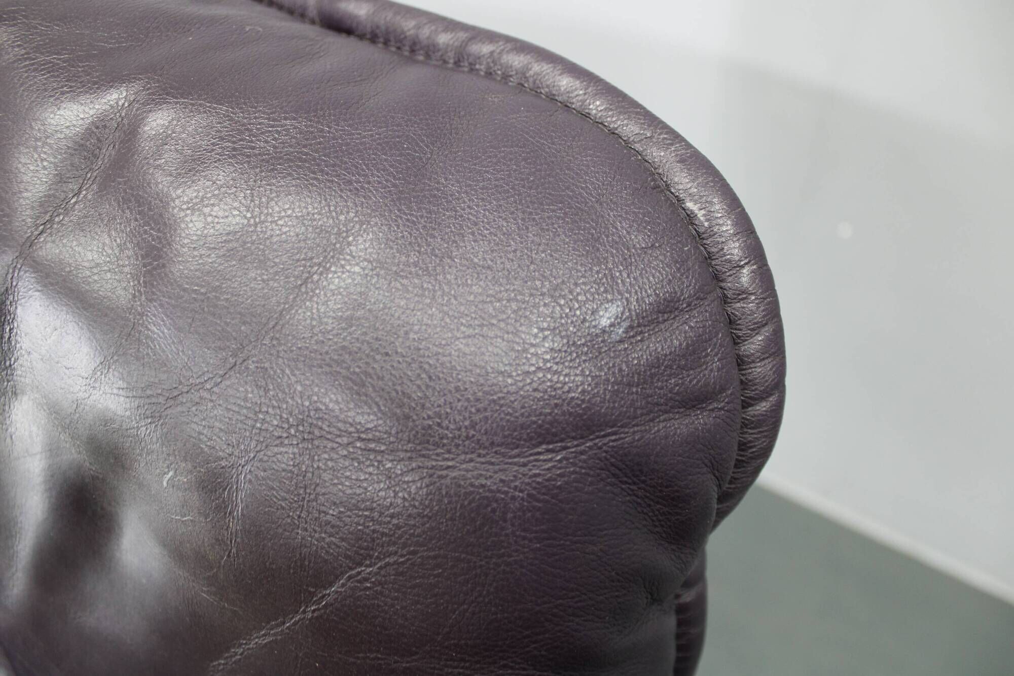 Italian dark purple leather swivel lounge chair, 1980s