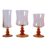 Service of 18 glasses with amber feet 70s
