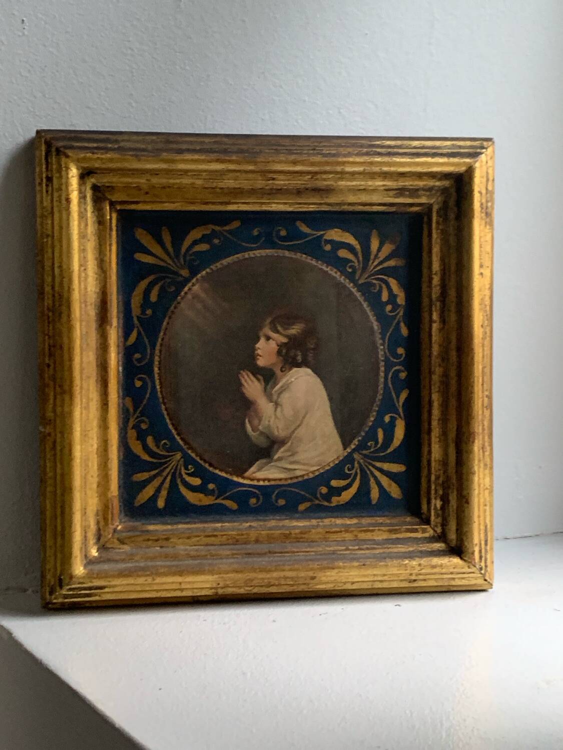 Old golden frame Little Samuel in prayer