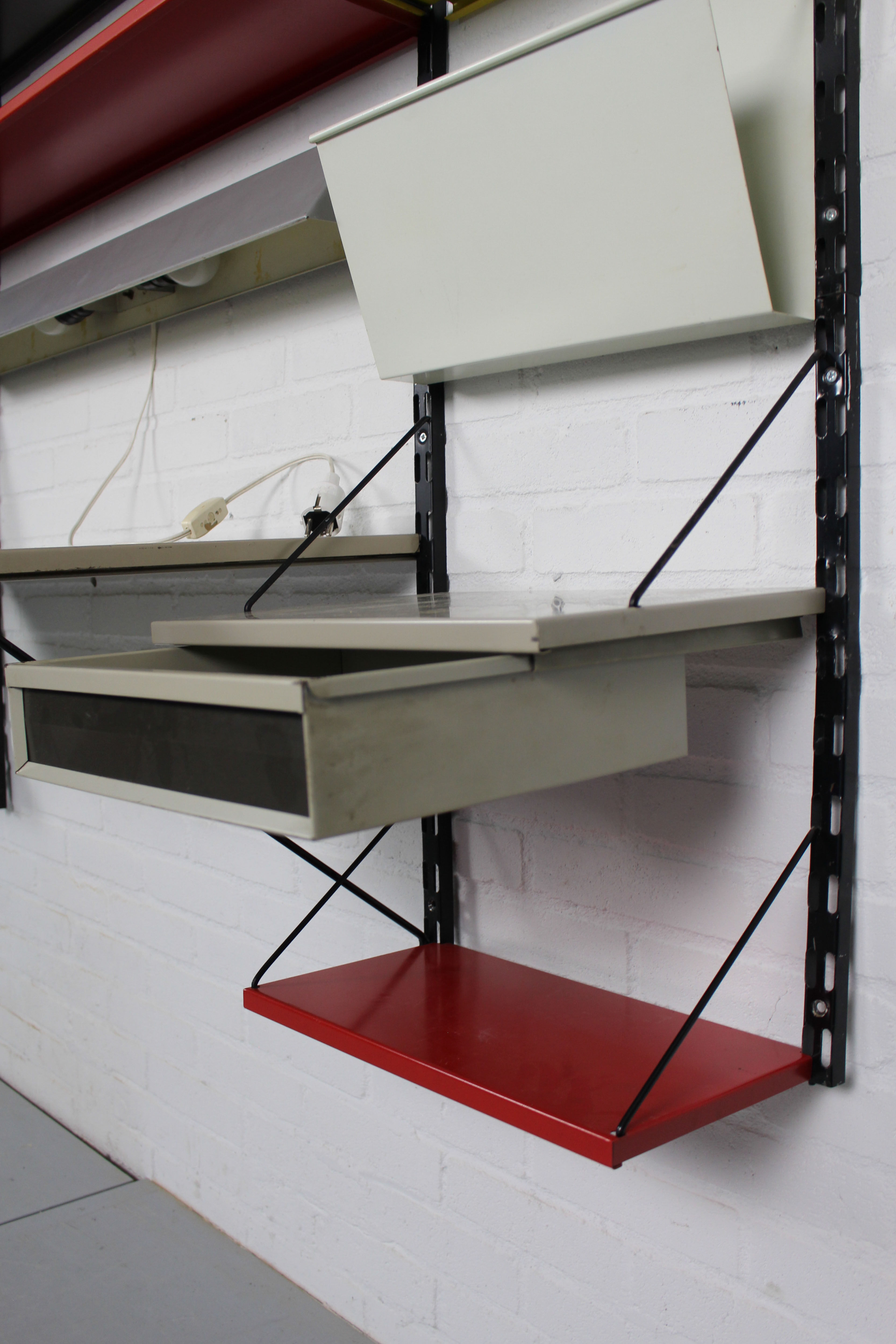 Wall Unit by Tjerk Reijenga for Pilastro with die cut magazine shelve