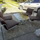 Table and 4 chairs in chrome metal with brown fabric and wood, Hungarian design from the 1960s.