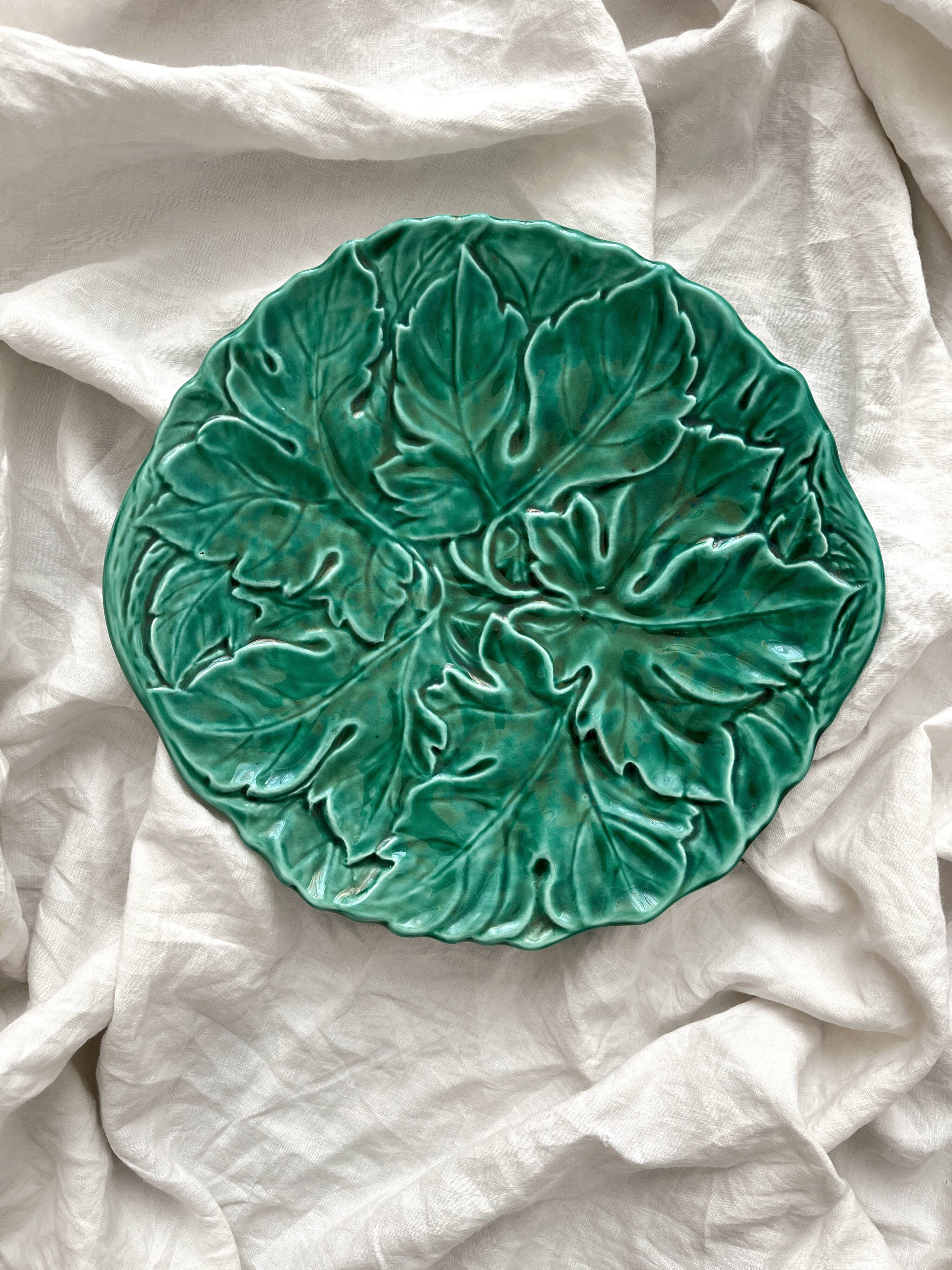 Round barbotine dish decorated with green leaves, Digoin vintage