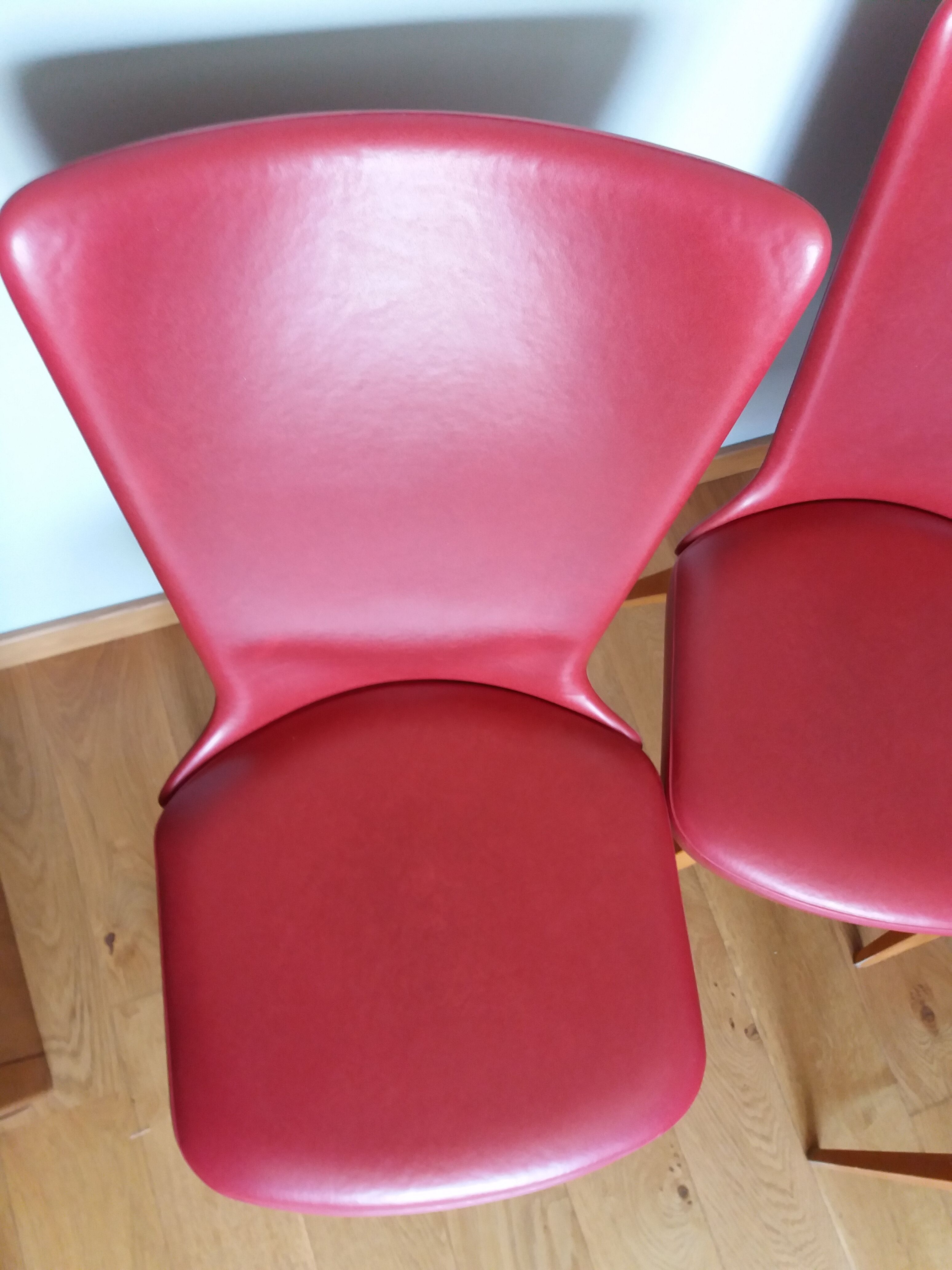 Baumann skai red imitation leather chairs from the 1950s