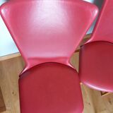 Baumann skai red imitation leather chairs from the 1950s