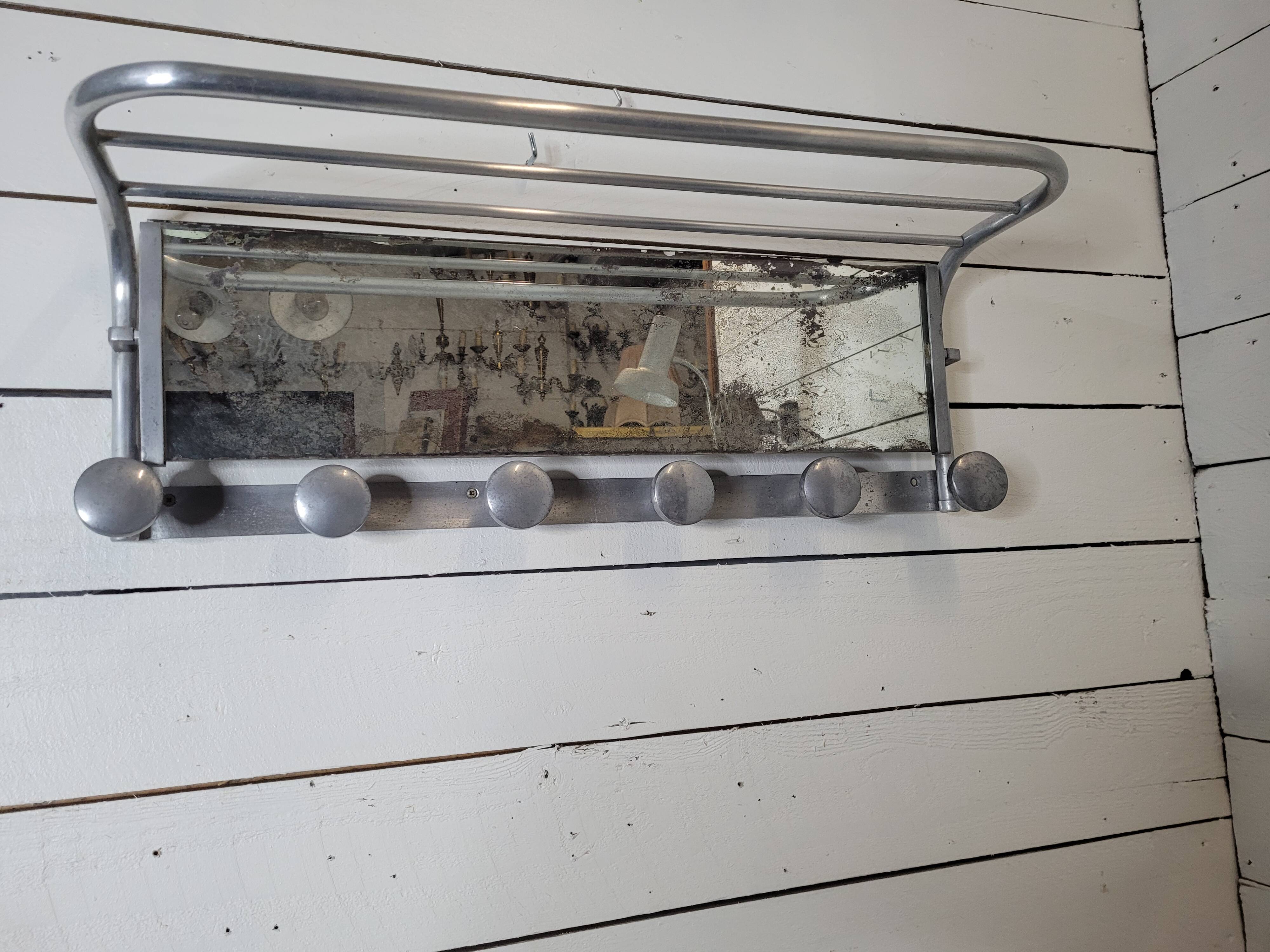Swivel aluminum mirror wall coat rack from the 60s