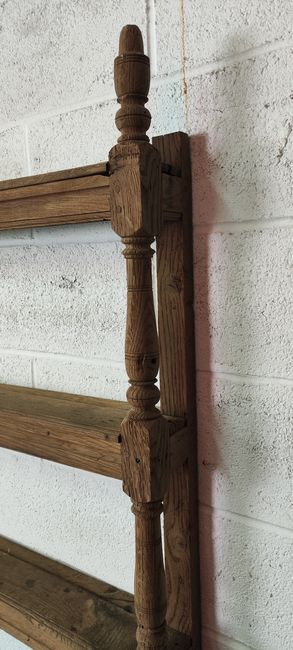 Old oak shelf back of glass counter wall