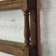 Old oak shelf back of glass counter wall