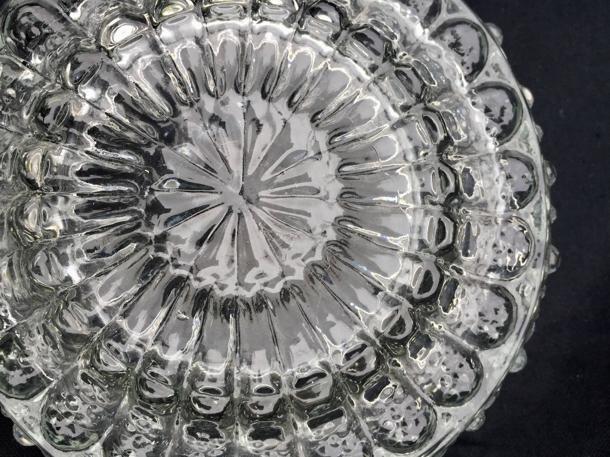 Round ceiling light or wall light in molded glass