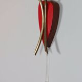 Vintage wall lamp from the 1950s in brass with flower decoration.