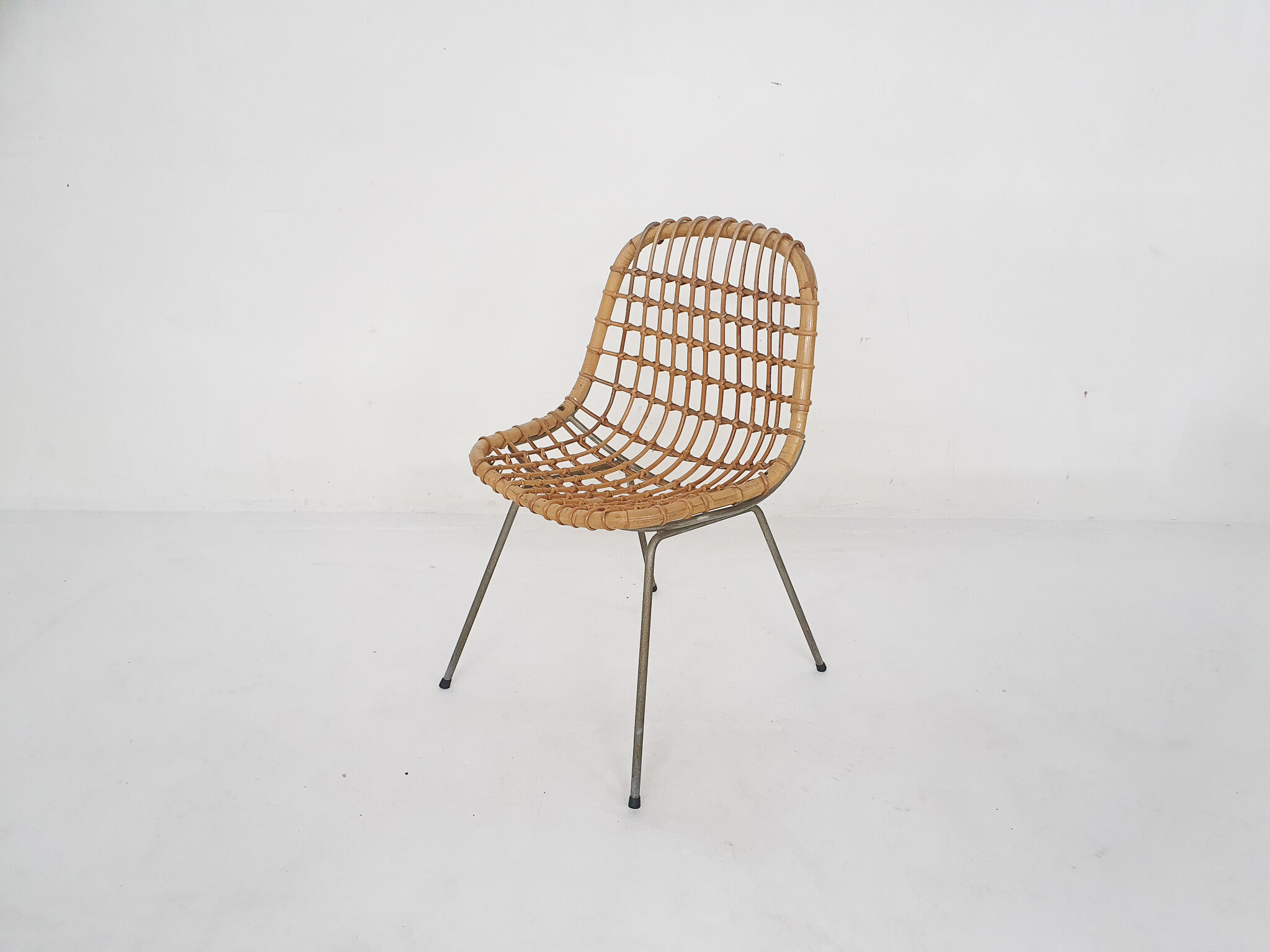 Vintage rattan and metal dining chair