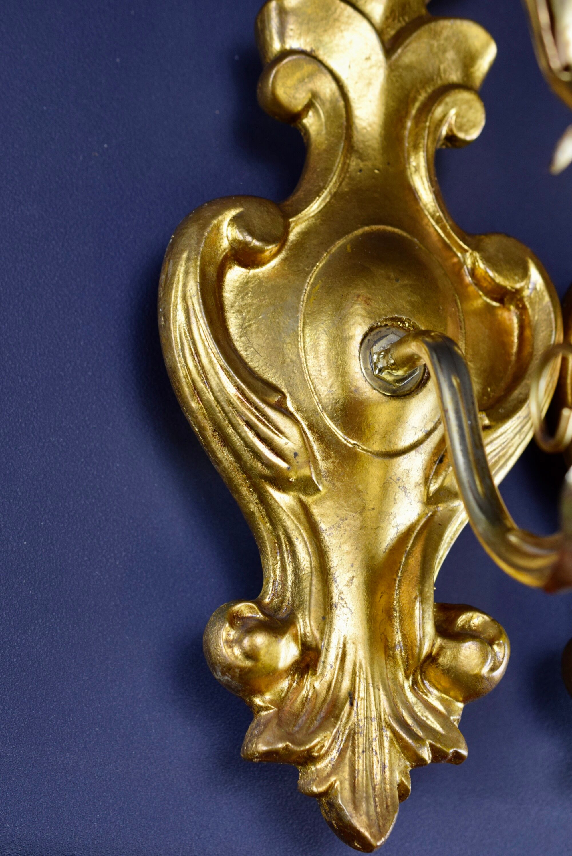 Pair of walled carved wood wall lamps