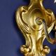 Pair of walled carved wood wall lamps