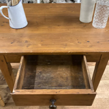 Rectangular wooden farmhouse table or rustic desk with antique drawer