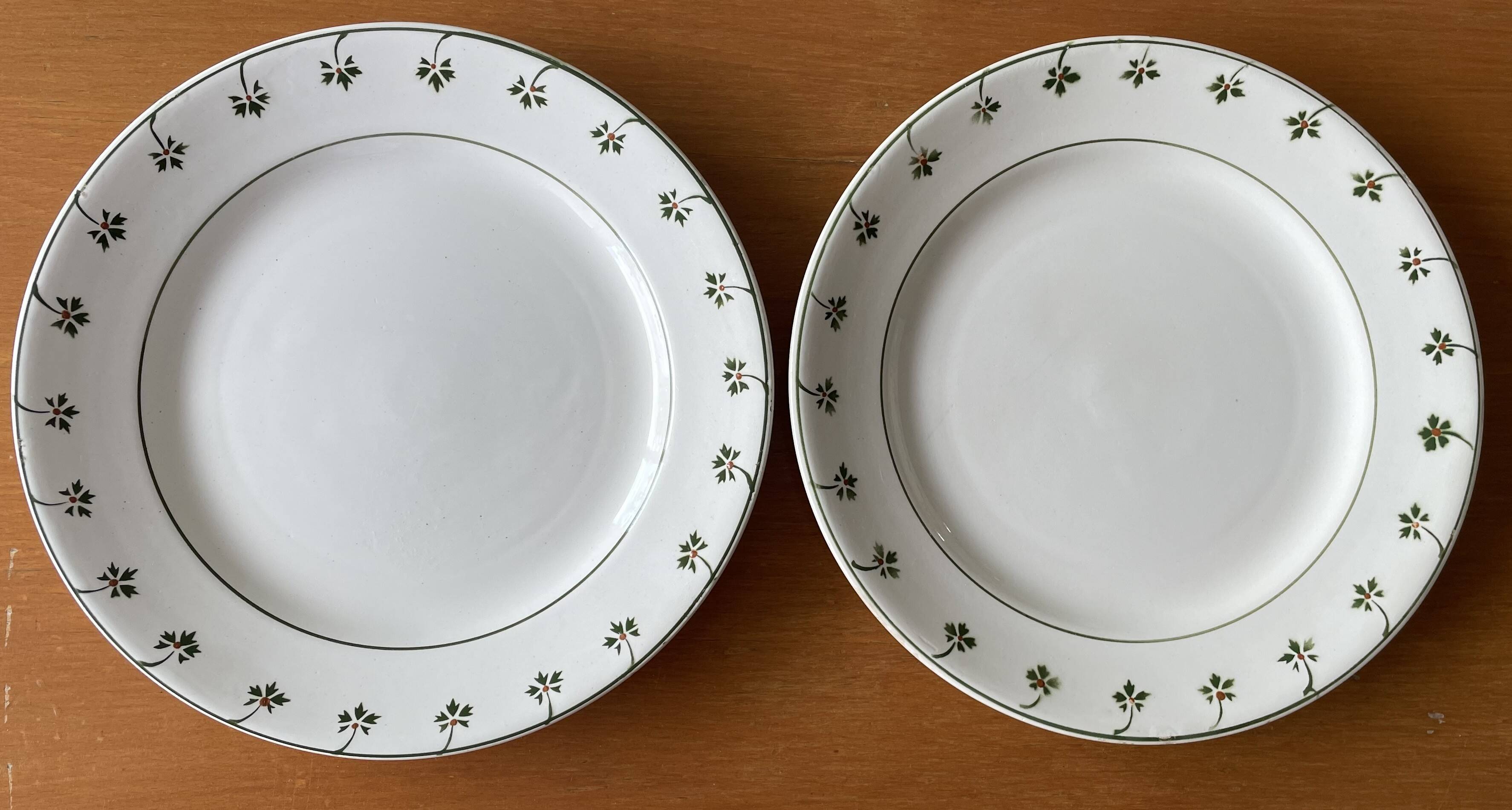 8 antique flat plates in Nimy earthenware