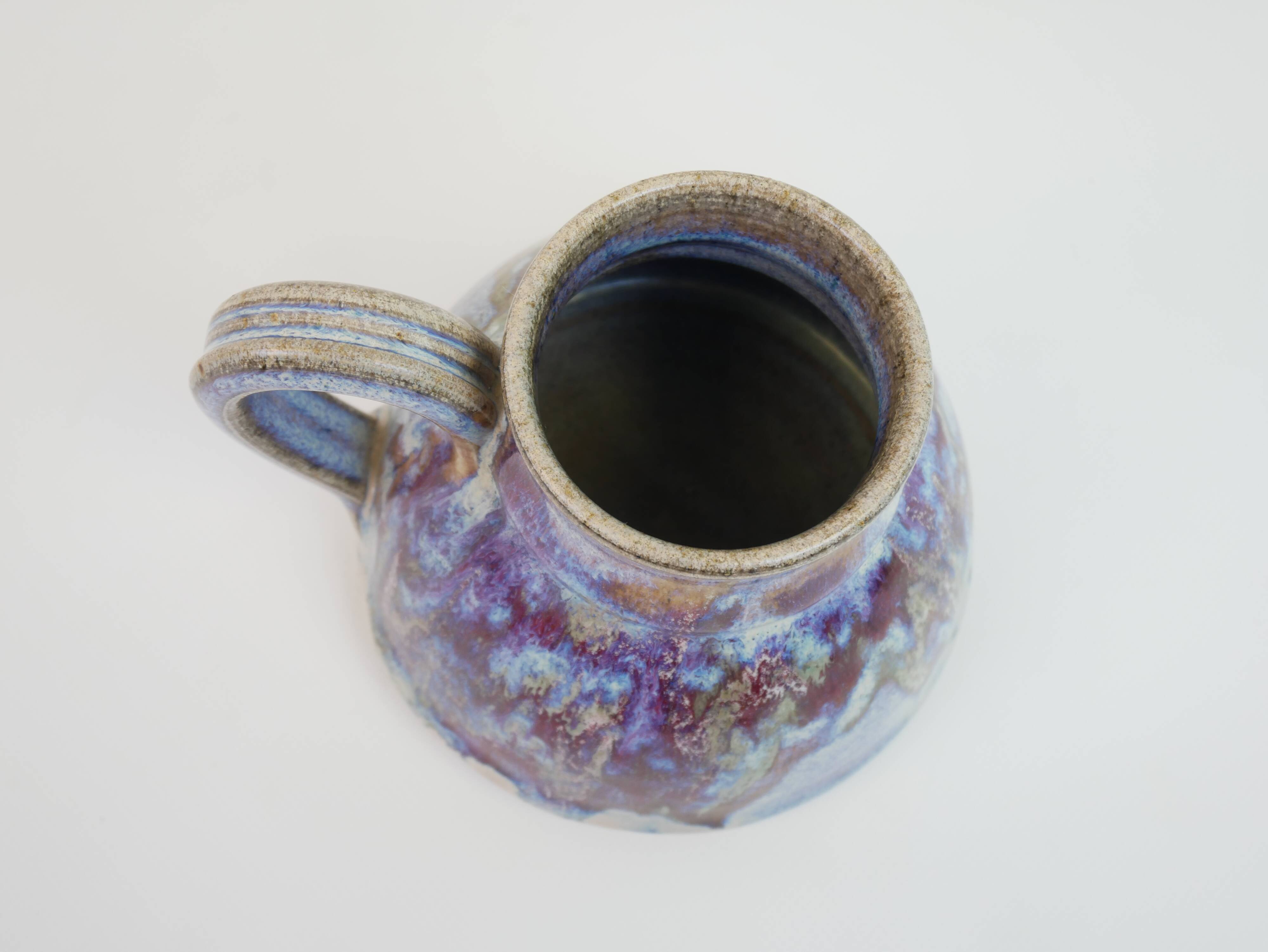 signed blue purple enamel ceramic pitcher