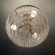 Vintage chandelier cascade of crystal and brass tassels