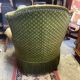 Green velvet toad armchair with wheels and fringes