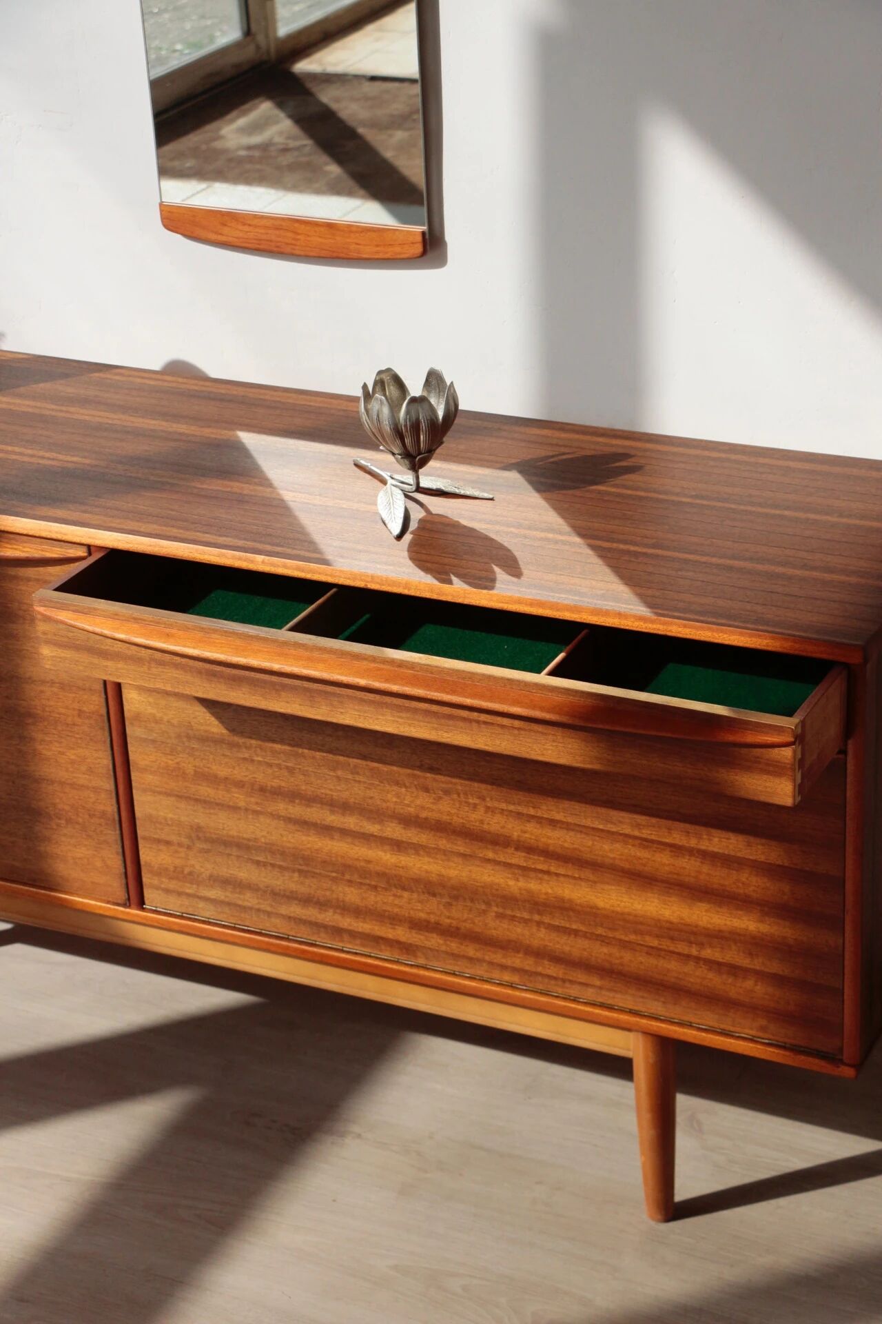 Vintage zebrano and walnut furniture from Morris of Glasgow.