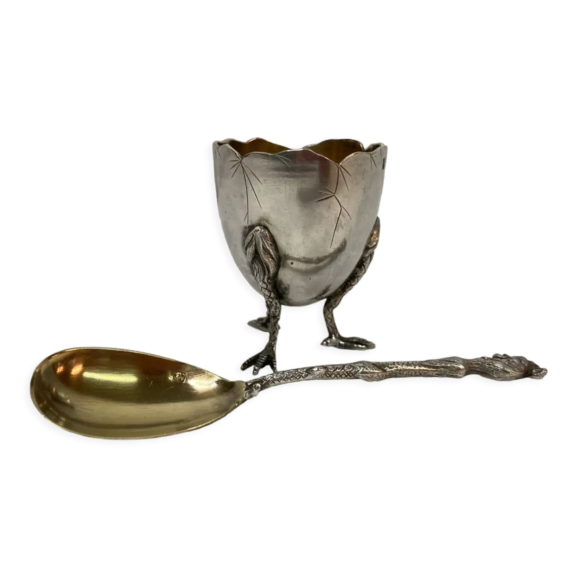 Eggcup feet and silver spoon punches early twentieth century