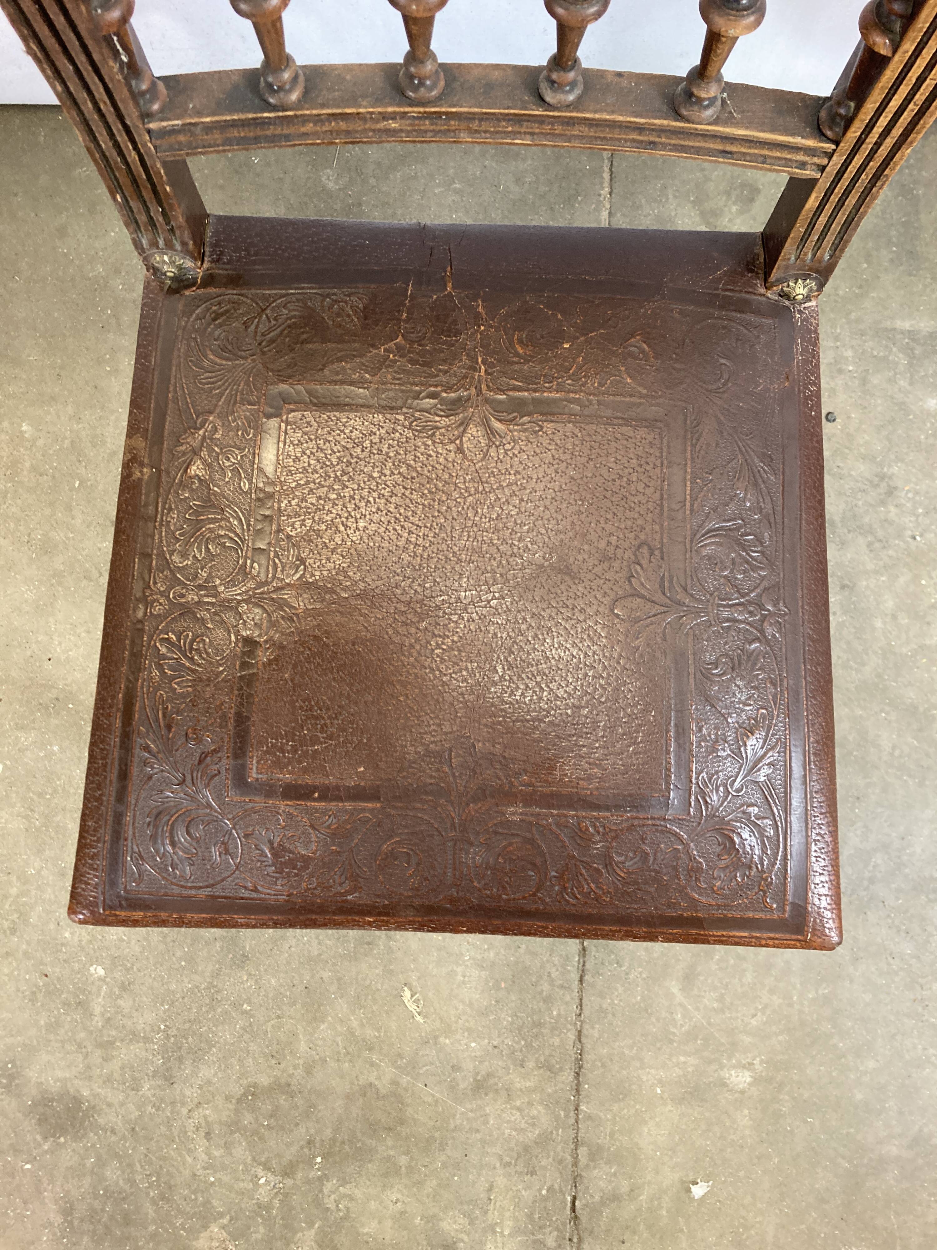Pair of Henry II wooden and leather chairs