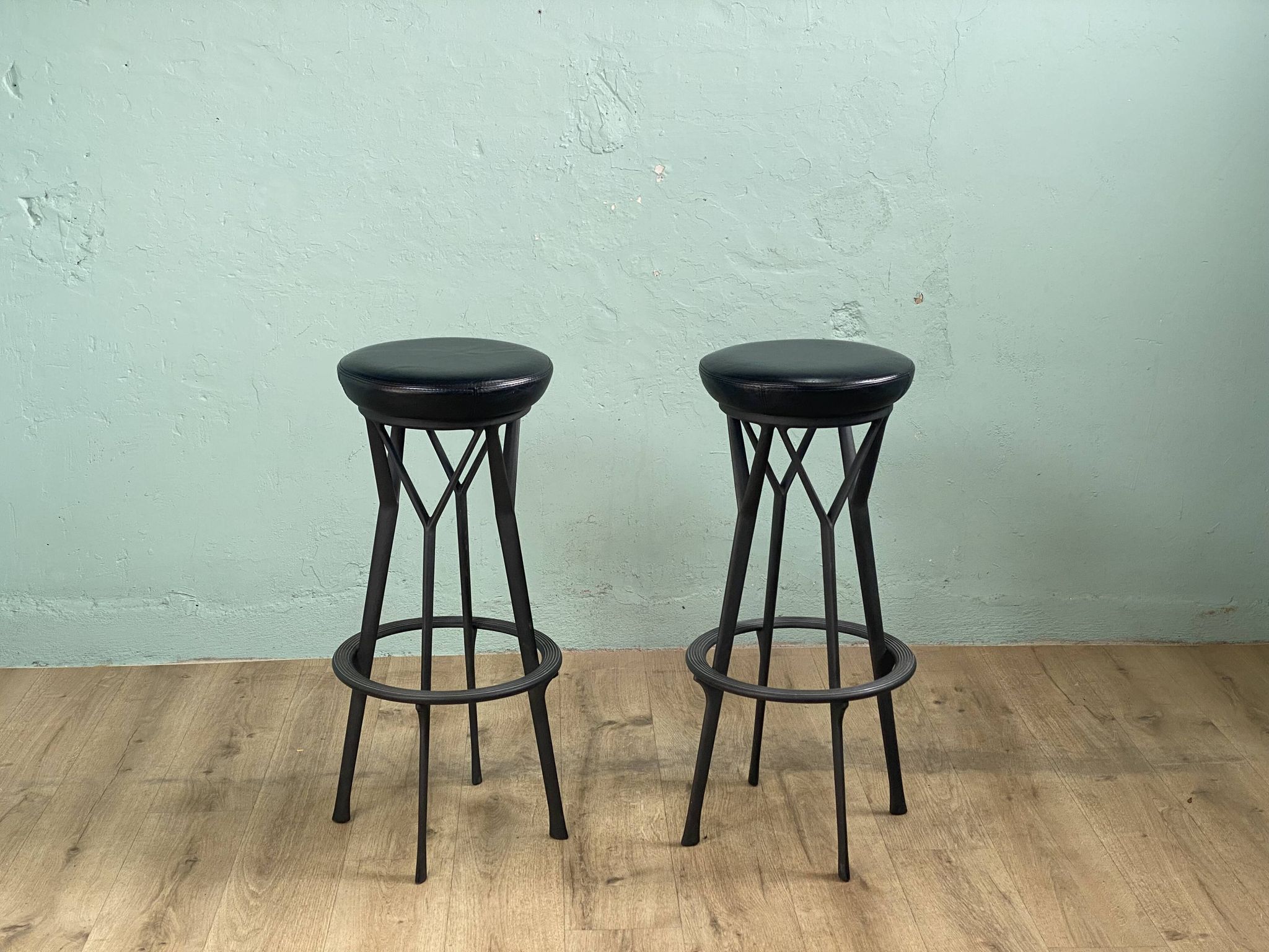 2 Yamakado designer swivel stools in black leather