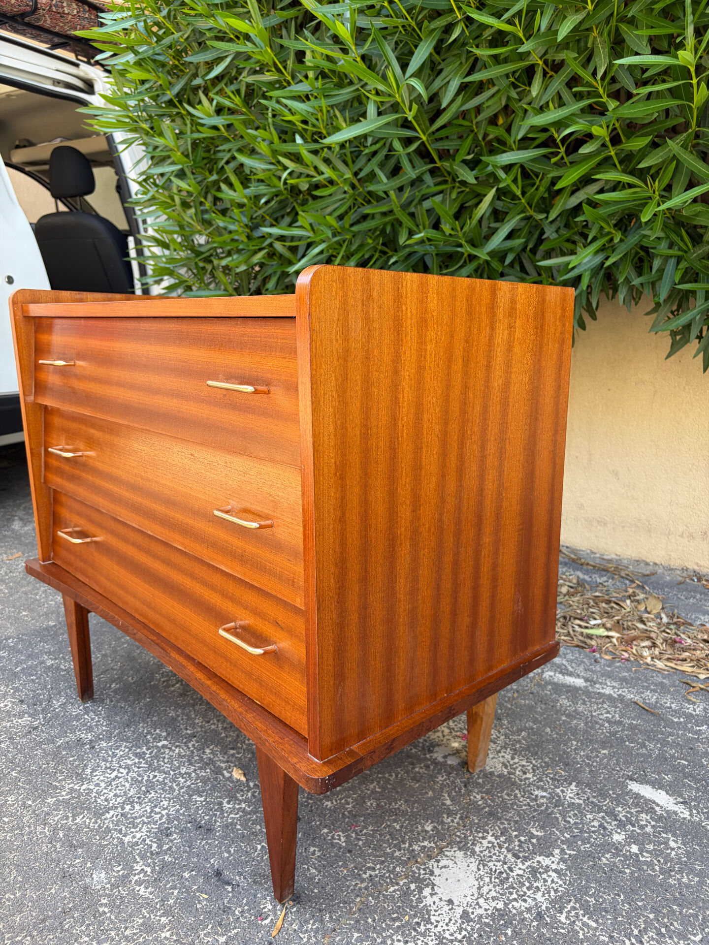 Vintage 1950s small chest of drawers with compass legs.