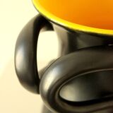 Two-handled vase, black and yellow glazed, in the style of Pol Chambost.