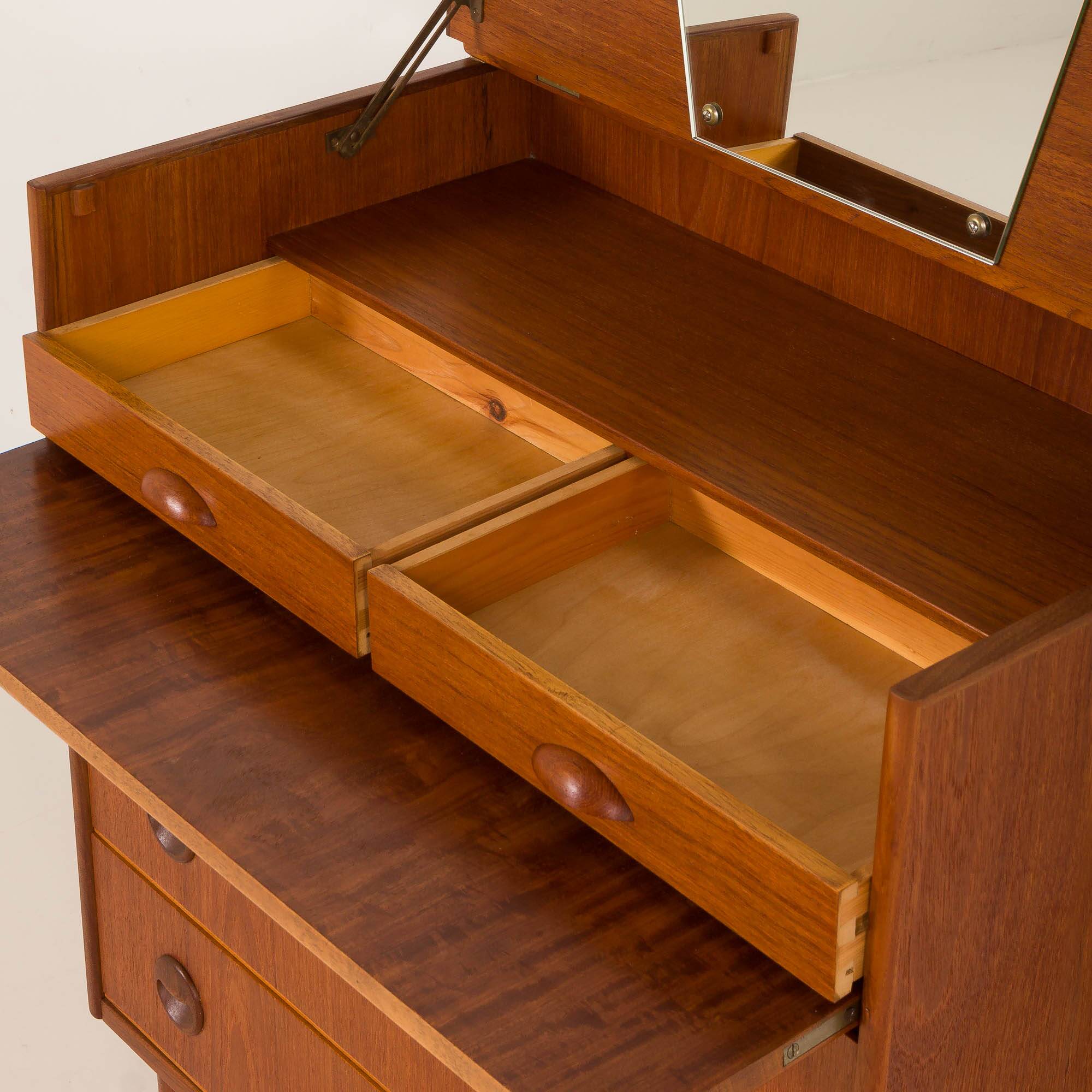 Danish mid century teak chest of drawers with hidden vanity, 1960s