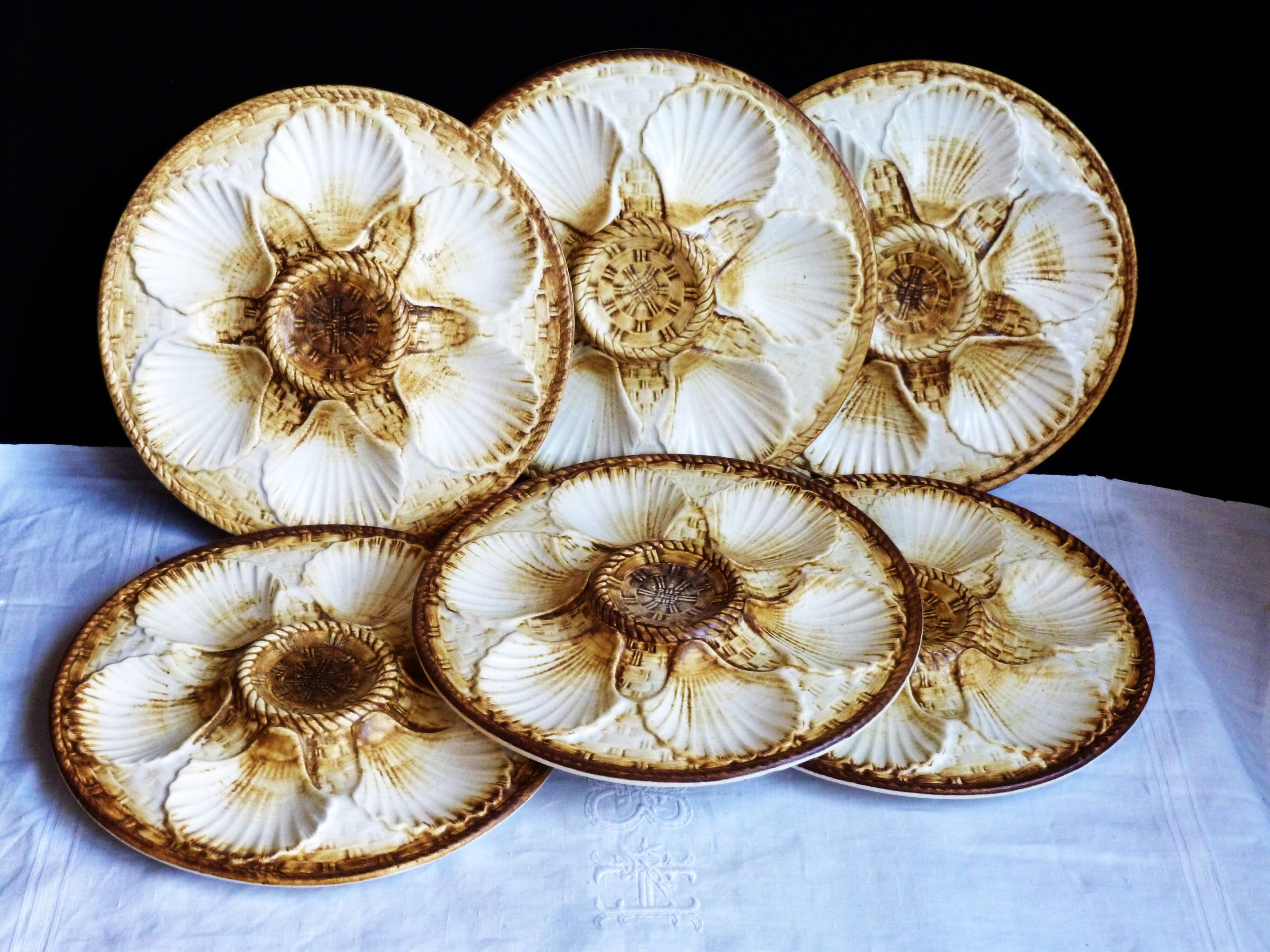 Oyster service, platter and 6 Longchamp oyster plates.