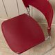 Chaise empilable en plastique rouge avec cadre en chrome par Paolo Favaretto pour Assisa (Italie 1986) – design vintage